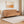Lisbon Neo 4 Seater Wooden Sofa Cum Bed - ( Premium Molfino Fabric- Beige )