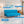 Florida 4 Seater Wooden Sofa Cum Bed - ( Premium Molfino Fabric- Sky Blue)