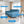 Lisbon  4 Seater Wooden Sofa Cum Bed - ( Premium Molfino Fabric-Sky Blue)