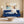 Florida Neo 4 Seater Wooden Sofa Cum Bed - ( Premium Molfino Fabric- Blue )
